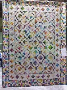 "Bloomin Step" Pieced by Erika Gillis, Quilted by Lynn Mokriy